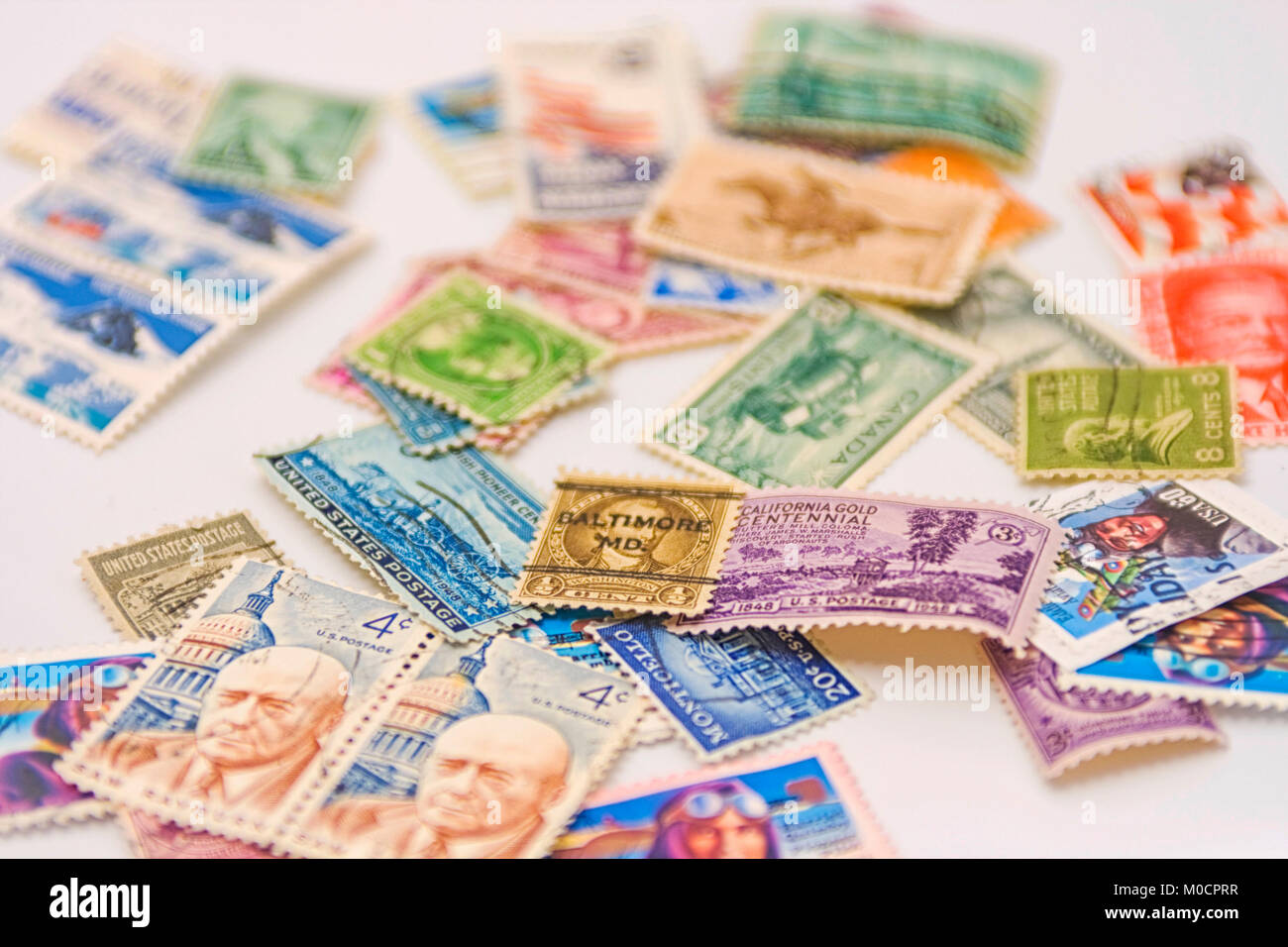 Bunch of old american postage stamps Stock Photo