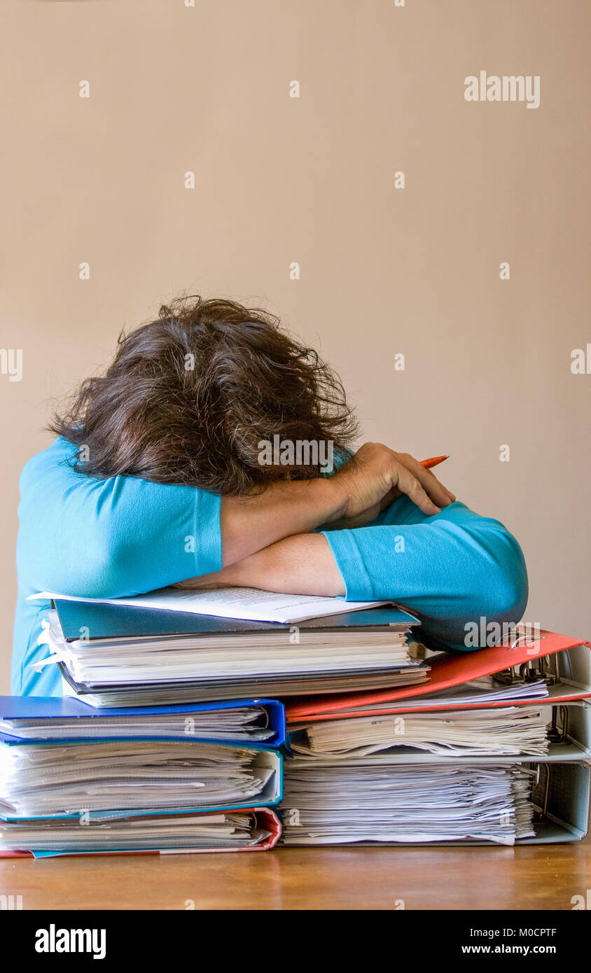 Mature woman stack paperwork hi-res stock photography and images - Alamy