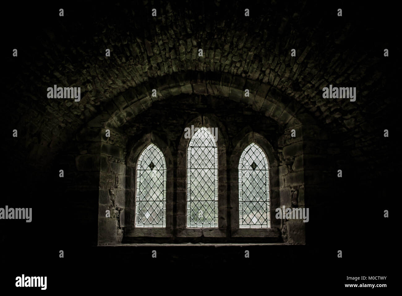 small  tryptych chaple window Stock Photo