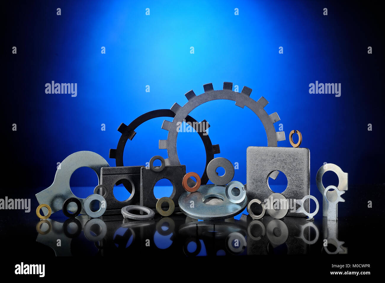 Set of many types of lock washers on blue background Stock Photo Alamy