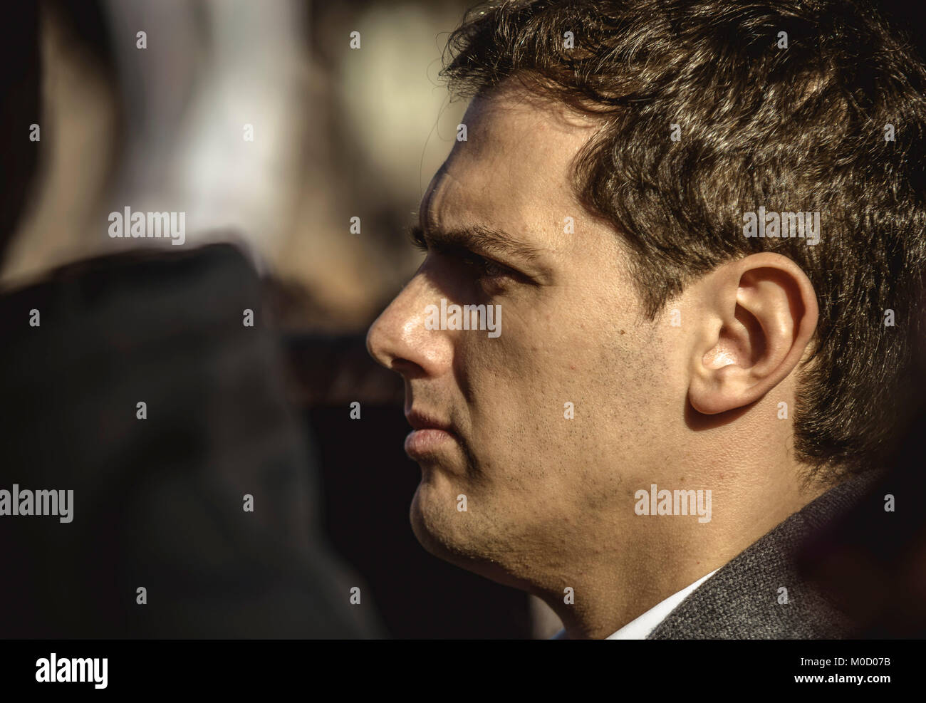 Barcelona, Spain. 20th Jan, 2018. ALBERT RIVERA, president of the Citizens party, C's, listens to a speech at the end of a demonstration in Barcelona by tens of thousands of police officers of the National Police and Civil Guard for a salary equality with the regional police forces Credit: Matthias Oesterle/Alamy Live News Stock Photo