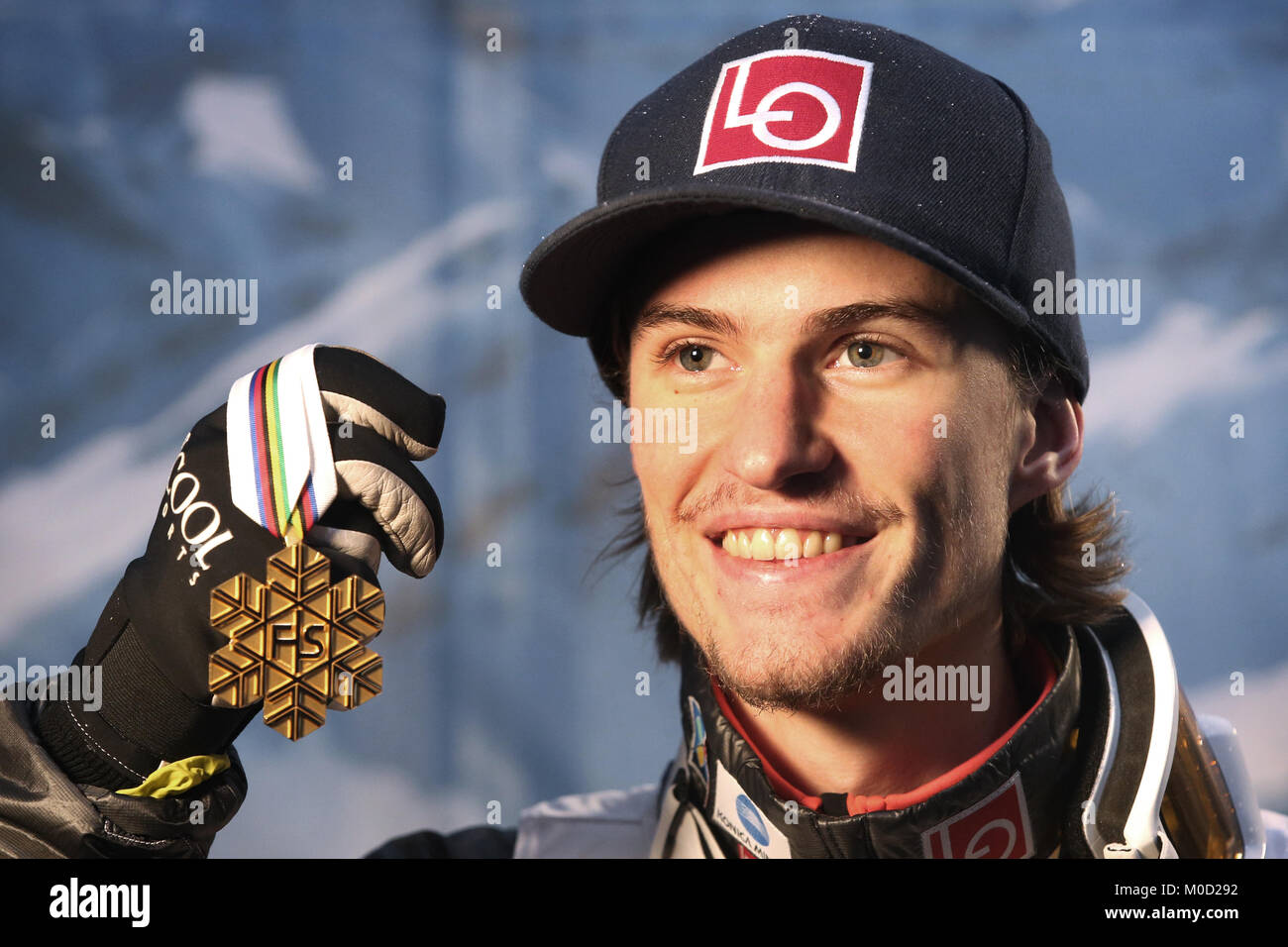 Daniel Andre Tande of Norway holds up his gold medal at the Ski Flying World Championships in Oberstdorf, Germany, 20 Janaury 2018. Tande came first in the individual competition. Photo: Karl-Josef Hildenbrand/dpa Stock Photo