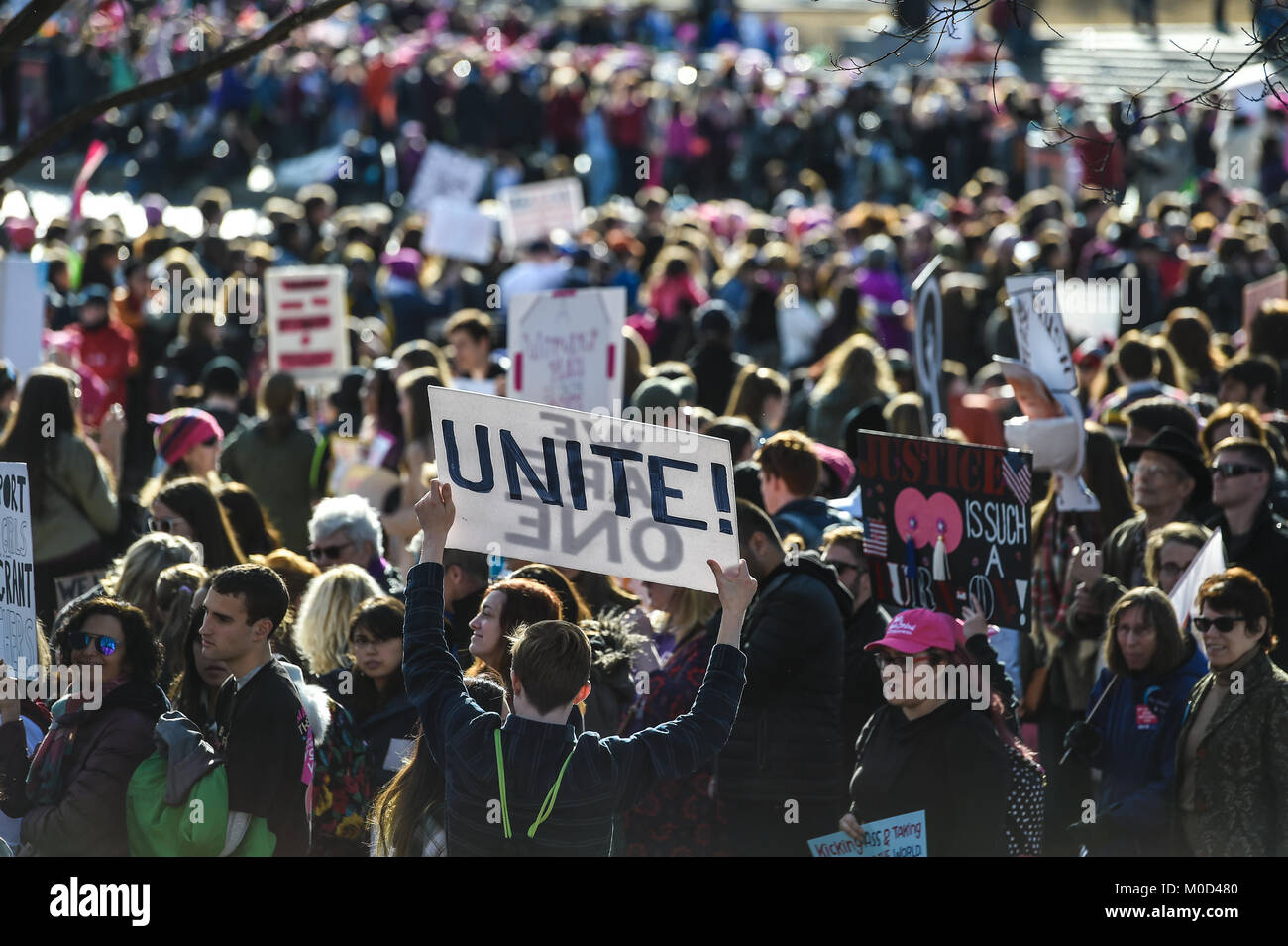Washington DC, USA. 20th Jan, 2018. Jan. 20th Jan, 2018. A man holds a unite sign in the sea of people marching during the Women's March around Lincoln Memorial in Washington, DC, on Jan. 20, 2018 in Washington Credit: csm/Alamy Live News Credit: Cal Sport Media/Alamy Live News Stock Photo