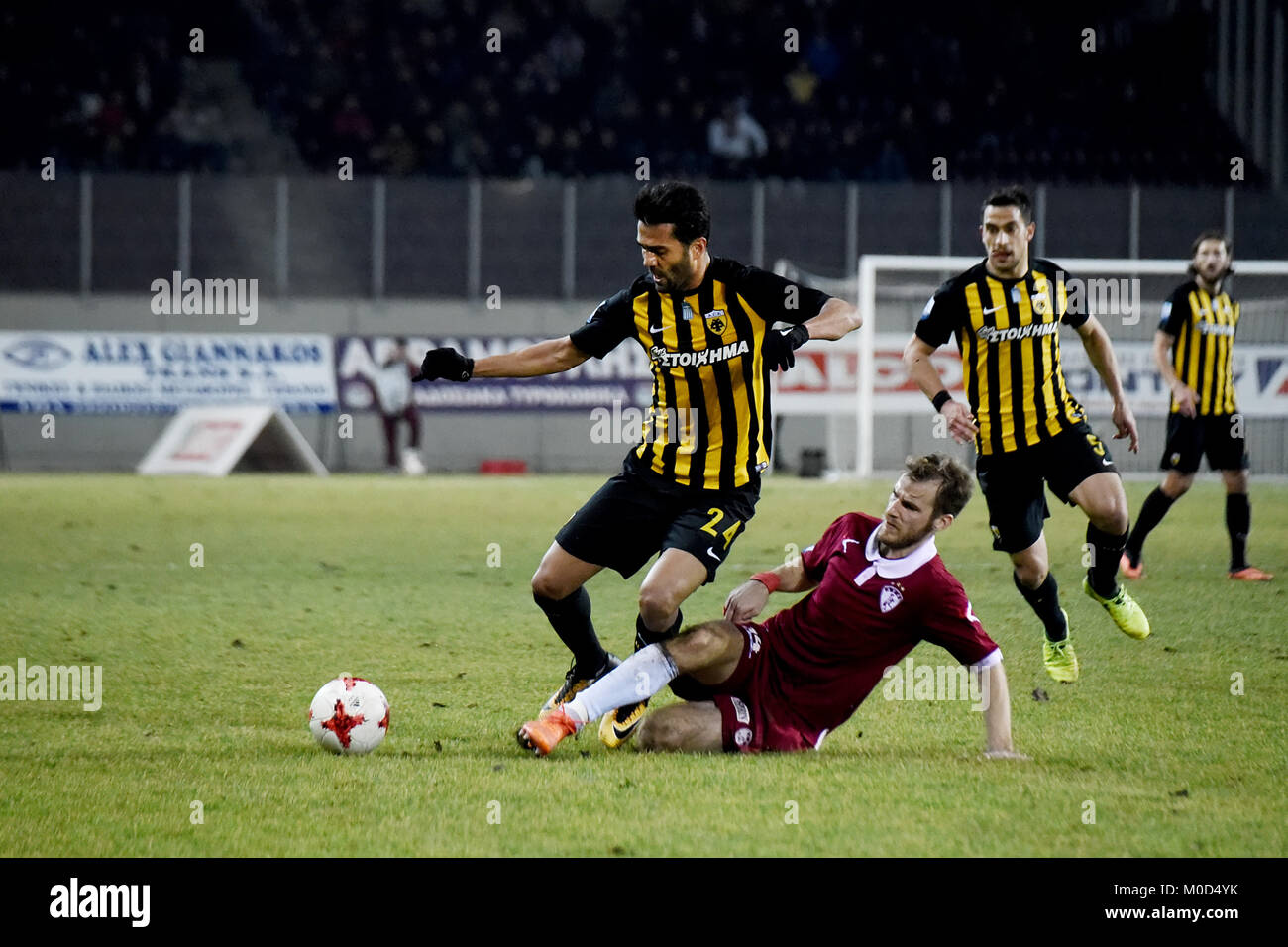 Larissa, Greece. 20th Jan, 2018. AEK FC midfielder Masoud Shojaei (Left) in  action, during a Greek Superleague soccer match at the Greek city of  Larissa between AEL FC and AEK FC. The