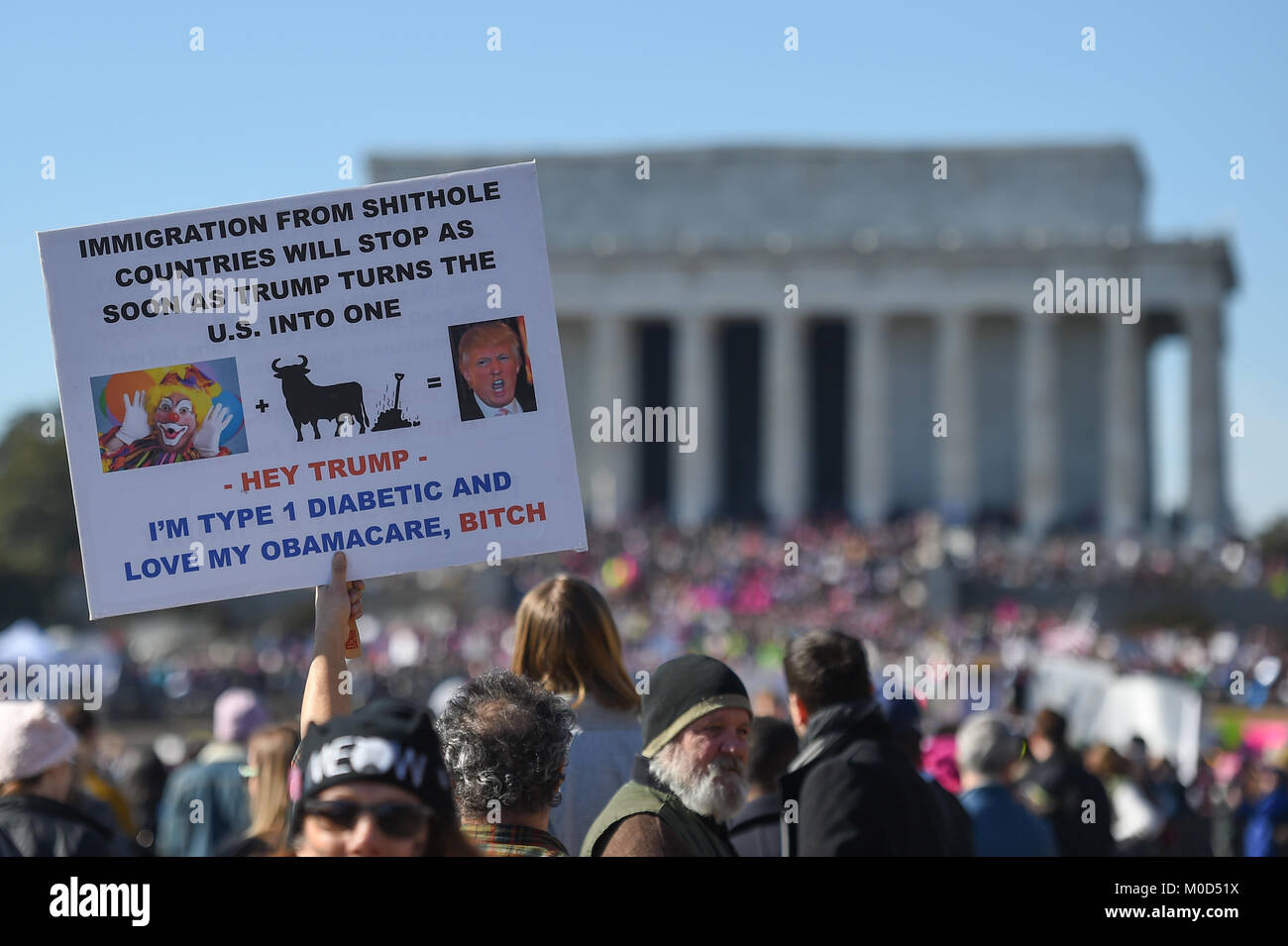 Washington DC, USA. 20th Jan, 2018. Jan. 20th Jan, 2018. A protestor holds a sign with the Lincoln Memorial in the background during the Women's March around Lincoln Memorial in Washington, DC, on Jan. 20, 2018 in Washington Credit: csm/Alamy Live News Credit: Cal Sport Media/Alamy Live News Stock Photo
