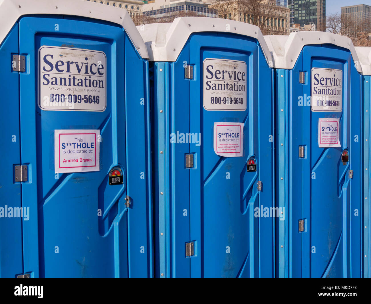 Chicago, Illinois, USA. 20th January 2018. Nearly 300,000 women and men gathered in Grant Park  for the Women's March to the Polls in this city today.  Mobile toilets featured dedications mocking a recent statement by President Trump. Stock Photo