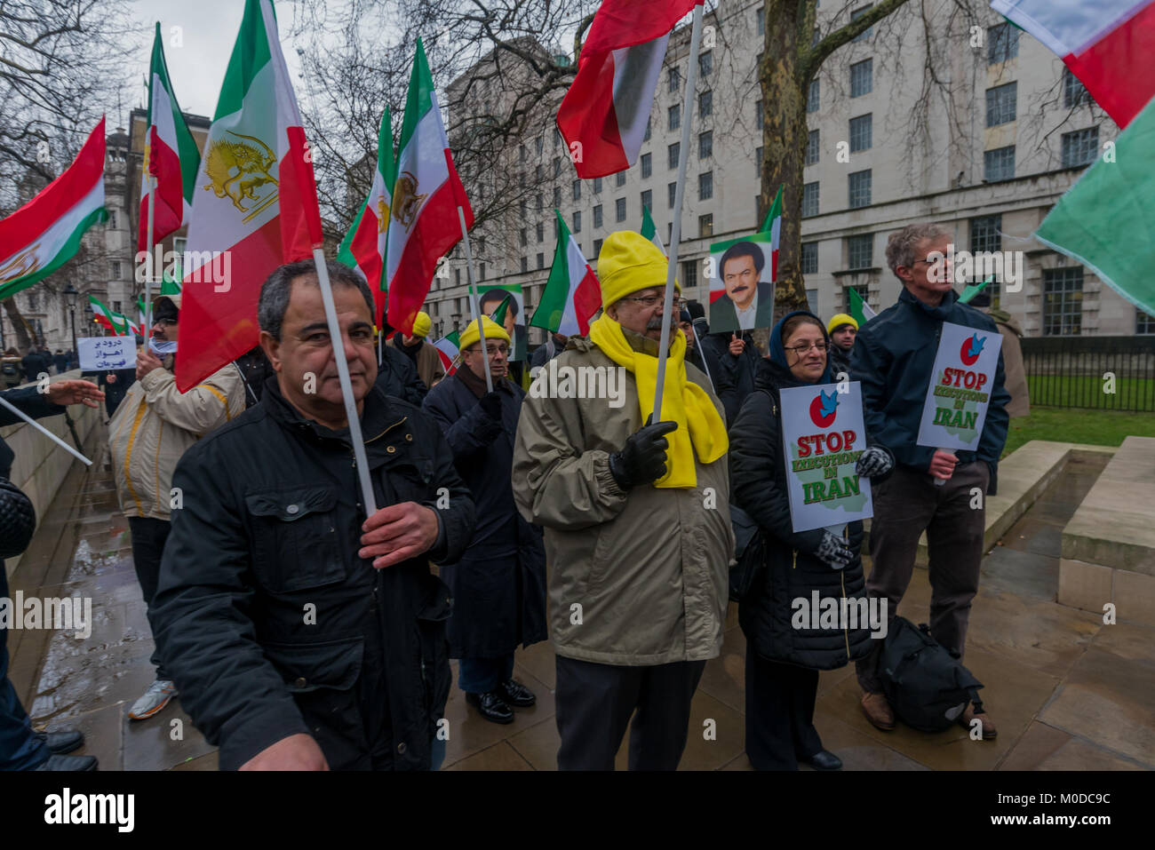 January 20, 2018 - London, UK. 20th January 2018. Protesters opposite Downing St urged UK Prime Minister Theresa May to break her silence over the uprising in Iran and call for the immediate release of the thousands arrested and under threat of the death penalty. The protest was organised by the French-based National Council of Resistance of Iran (NCRI) and associated PMOI/MEK, an Iranian political''“militant organization in exile, and claims to represent 40 Anglo-Iranian communities. There were a wide range of speakers including several MPs. Credit: ZUMA Press, Inc./Alamy Live News Stock Photo