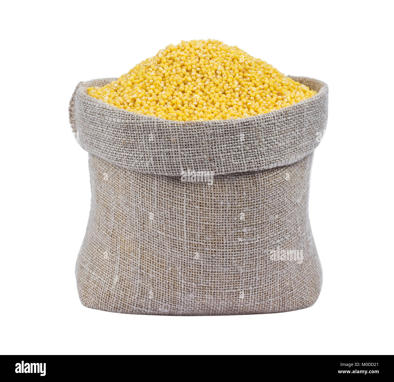 Millet in burlap bag isolated on white background Stock Photo