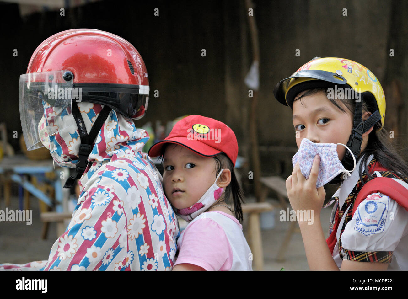 Mom and kids on a scooter, North Vietnam Stock Photo