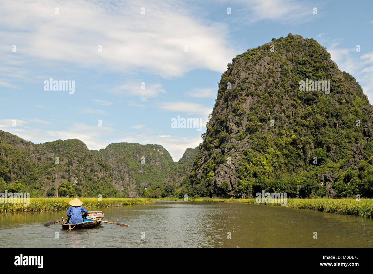 Local boat on the Ngo Dong River in Tam Coc, Ninh Binh Province, north Vietnam Stock Photo