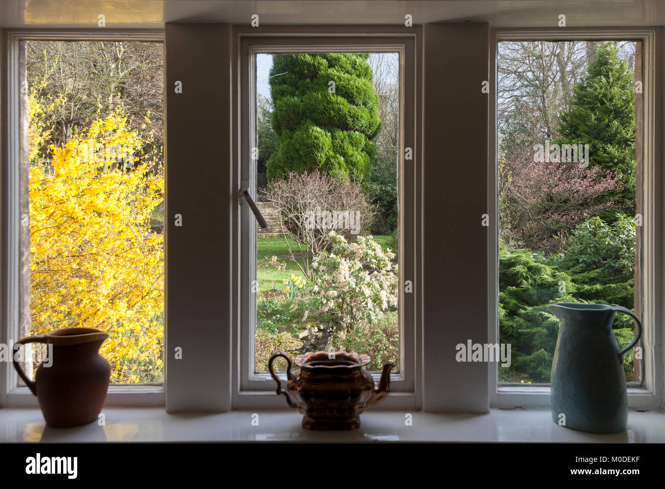 The view of a garden from the window of a country cottage in Yorkshire Stock Photo