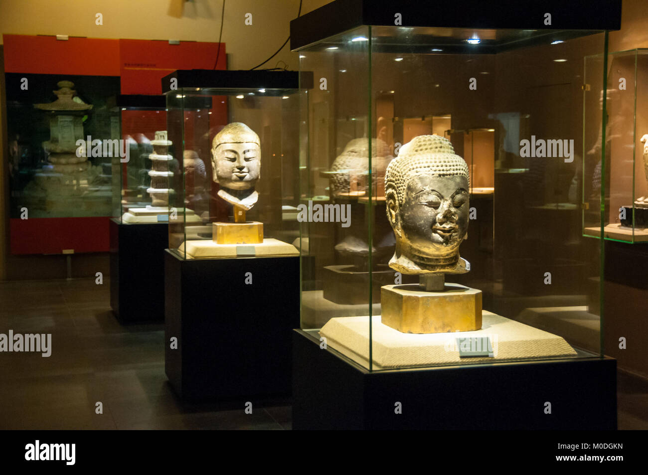 Buddha statue heads on display in the Xi’an Museum, Shaanxi Province ...