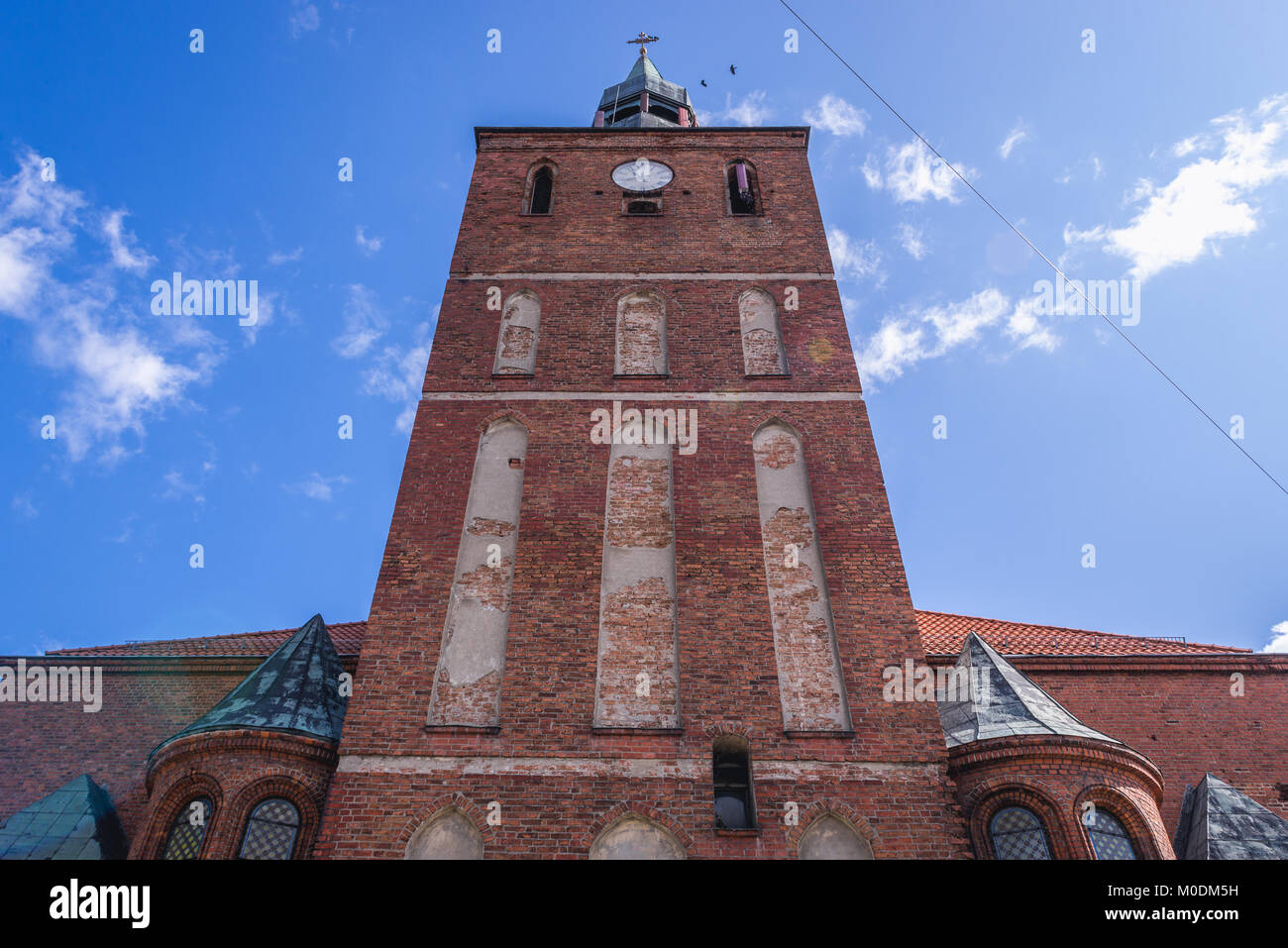 Bell tower of Church of Saint John the Baptist in Biskupiec city in ...