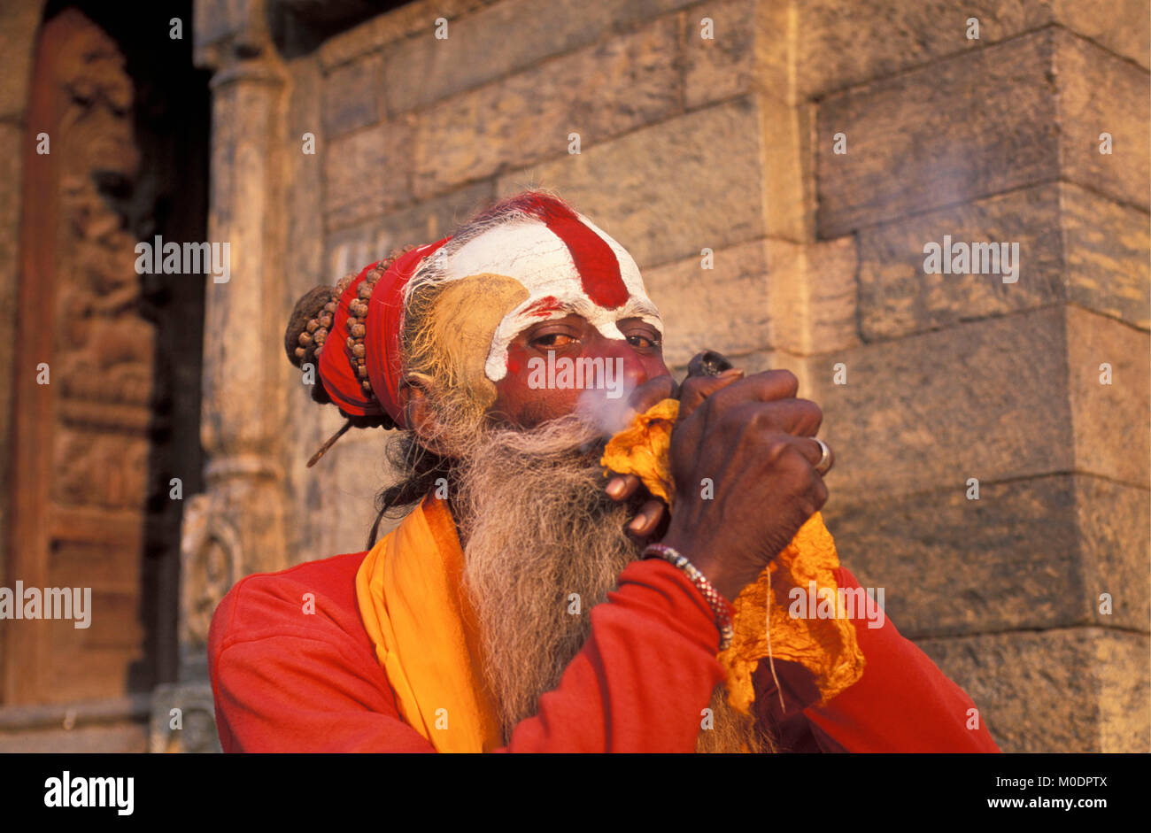 Nepal. Kathmandu. Pashupatinath temple (Hindu). Sadhu (holy man) by temple. Portrait. Stock Photo