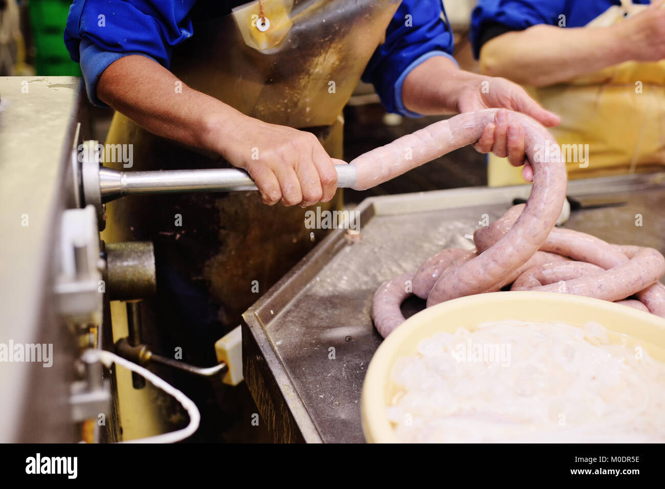 Butchers process meat Stock Photo Alamy