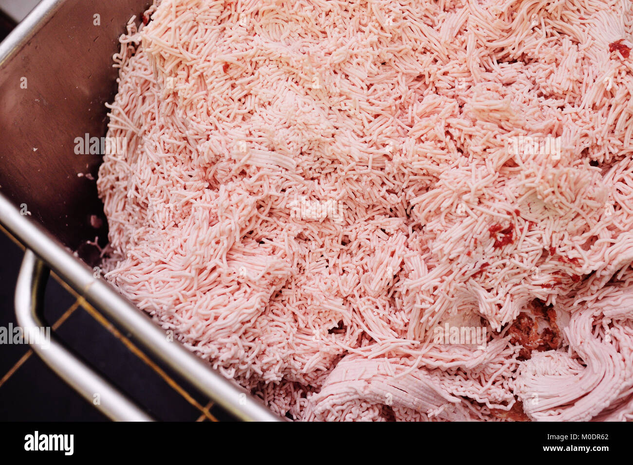 lard, pork or ground beef in metal containers in food production Stock