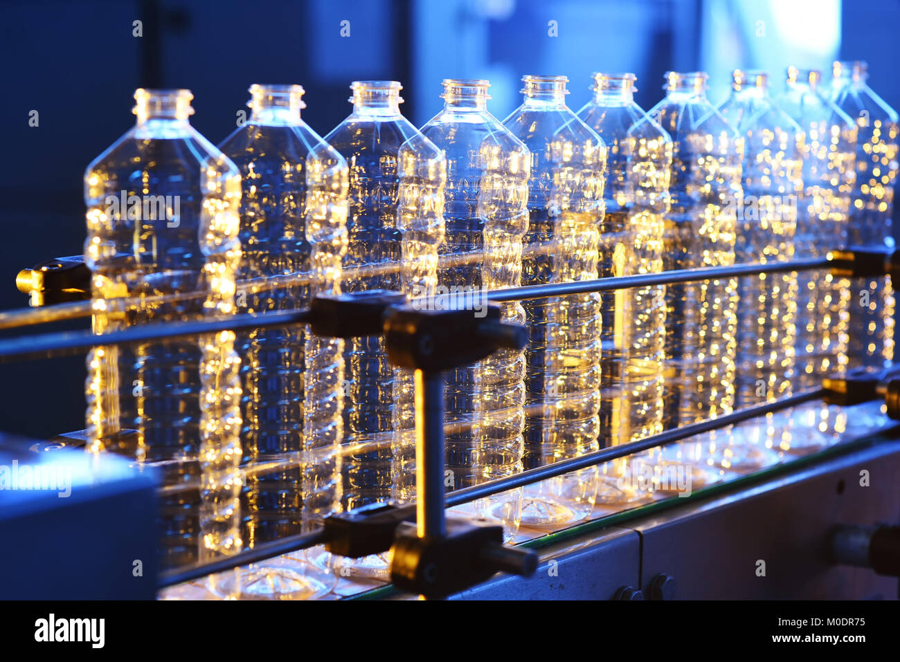 conveyor line for the production of plastic bottles Stock Photo