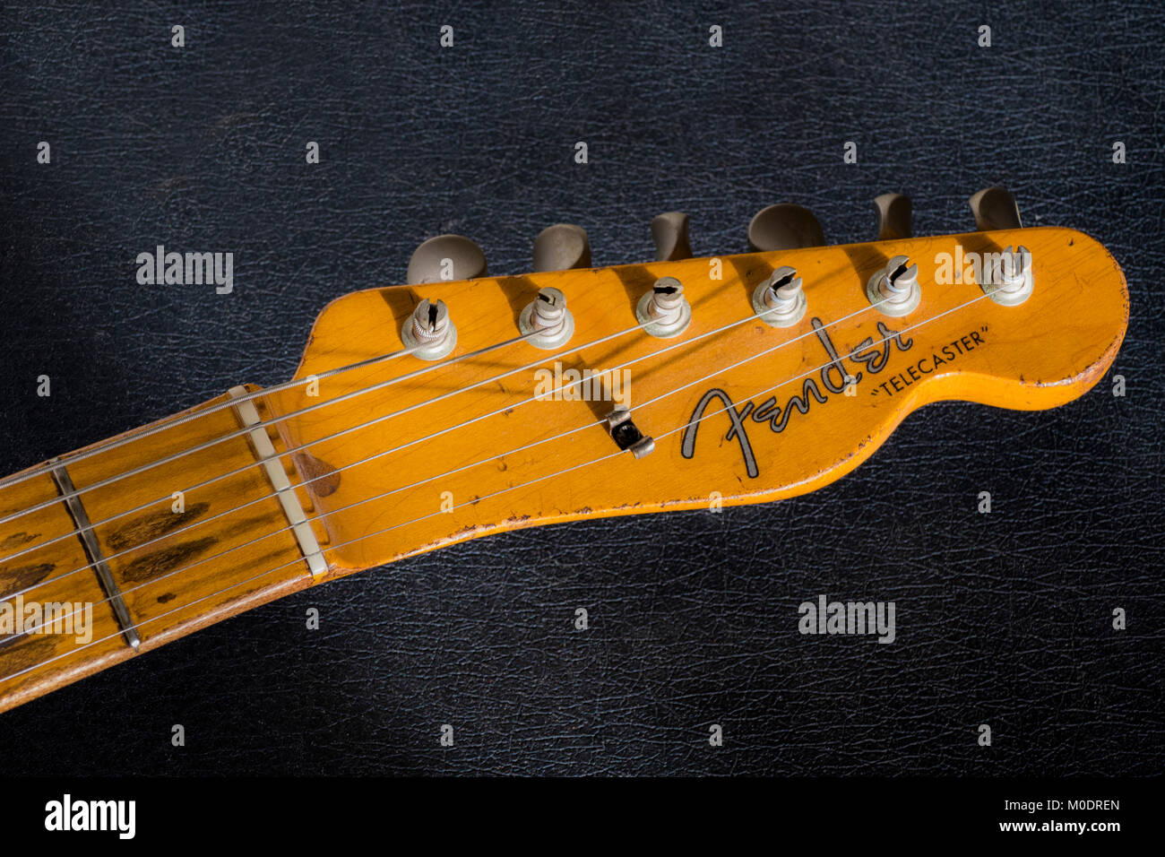 1957 Fender Telecaster electric guitar maple wood headstock, with worn  fretboard and 'spaghetti logo'. Vintage musical instrument, made in the USA  Stock Photo - Alamy
