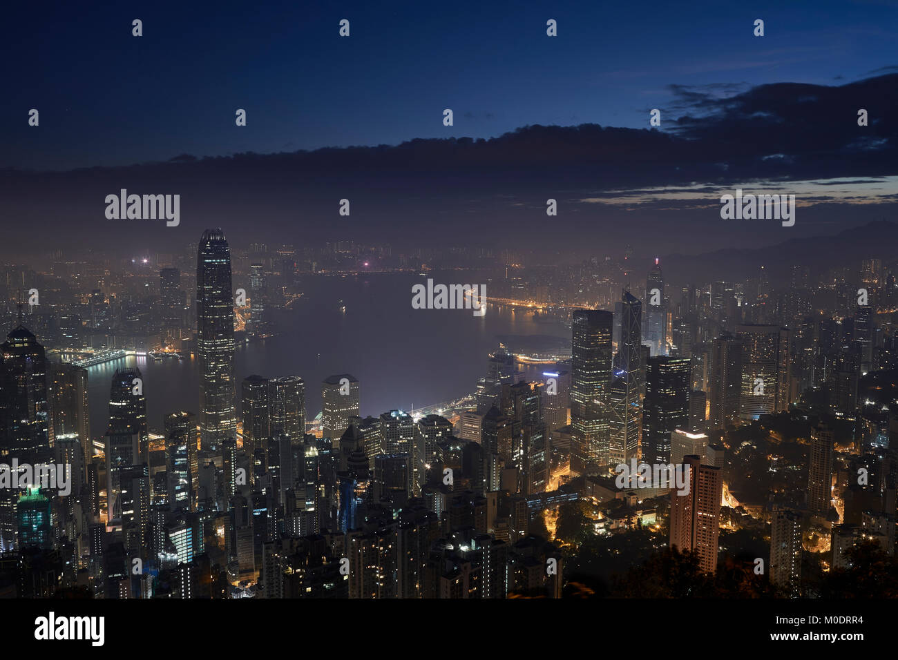 Nightime View Of The Hong Kong Cityscape Viewed From The Peak. Stock Photo