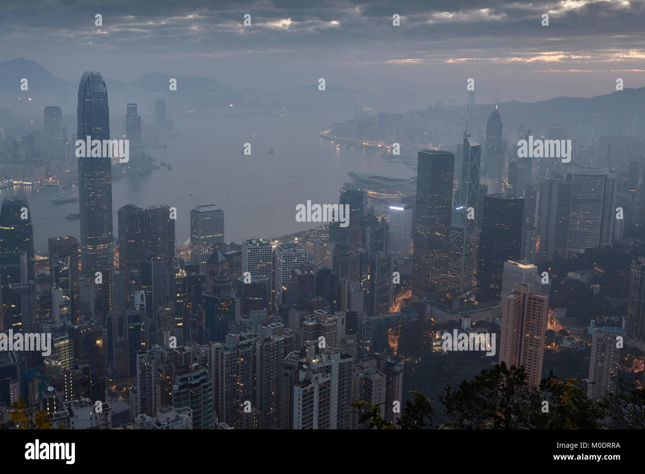 Aerial View Of The Hong Kong Skyline At Sunrise, Viewed From The Peak. Stock Photo