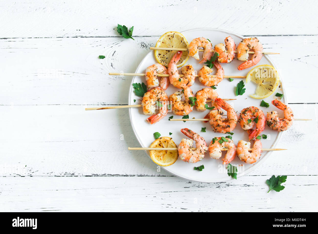 Grilled shrimp skewers. Seafood, shelfish. Shrimps Prawns skewers with