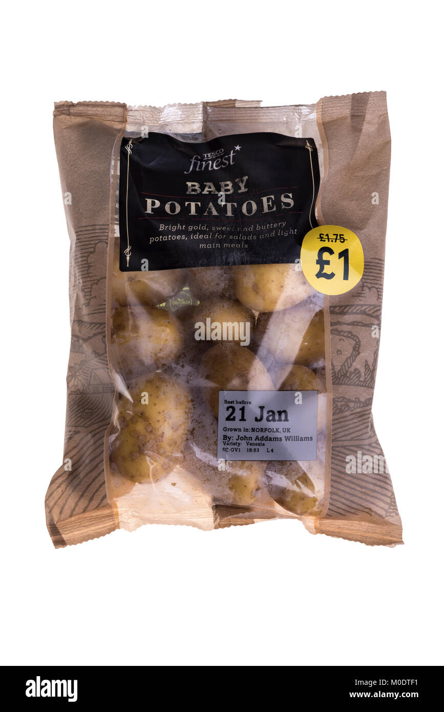 Tesco baby potatoes in plastic bag, supermarket plastic packaging. Stock Photo