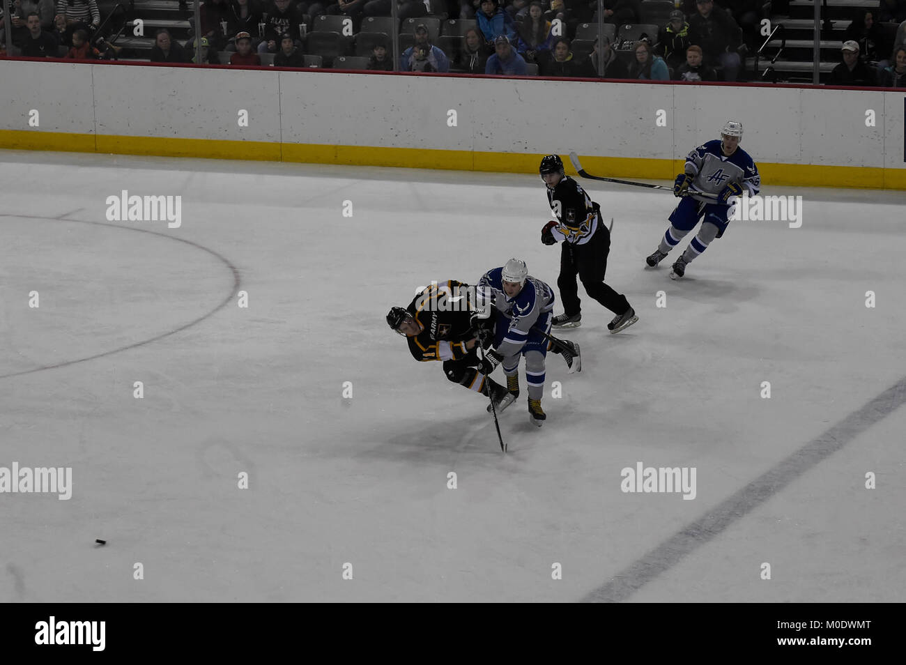Airmen and Soldiers compete in the 5th Annual Army vs. Air Force Hockey