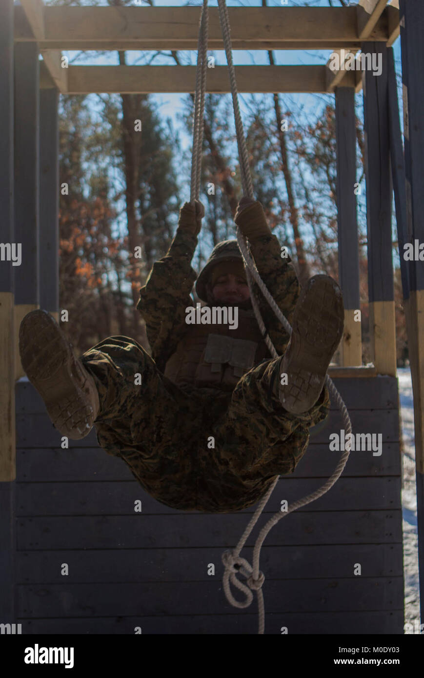 U.S. Marine Lance Cpl. Kameron V. Kraintz, a Data Systems Administrator assigned to Marine Wing Communications Squadron 48, participates in a team building exercise on the Field Leadership Reaction Course during Ullr Shield on Fort McCoy, Wis., Jan. 18, 2018. Ullr Shield is a training exercise designed to improve 2nd Marine Aircraft Wing's capabilities in extreme cold weather environments. (U.S. Marine Corps Stock Photo