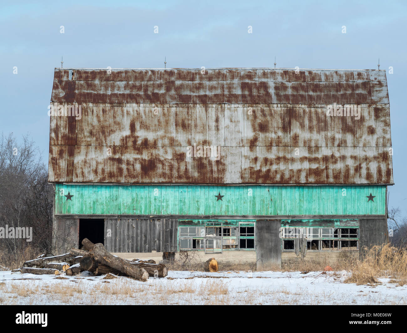 Old Green Barn With Glass Windows Stock Photo