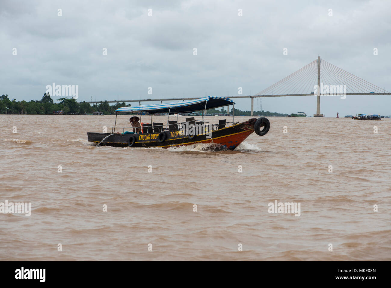 Boat on the Mekong river near My Thuan bridge, Vietnam Stock Photo
