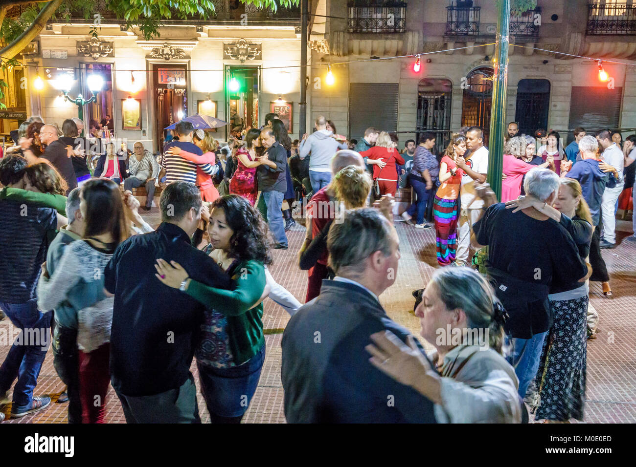 Buenos Aires Argentina,San Telmo,Plaza Dorrego,night nightlife evening after dark,tango dancers,dancing,adult adults man men male,woman women female l Stock Photo