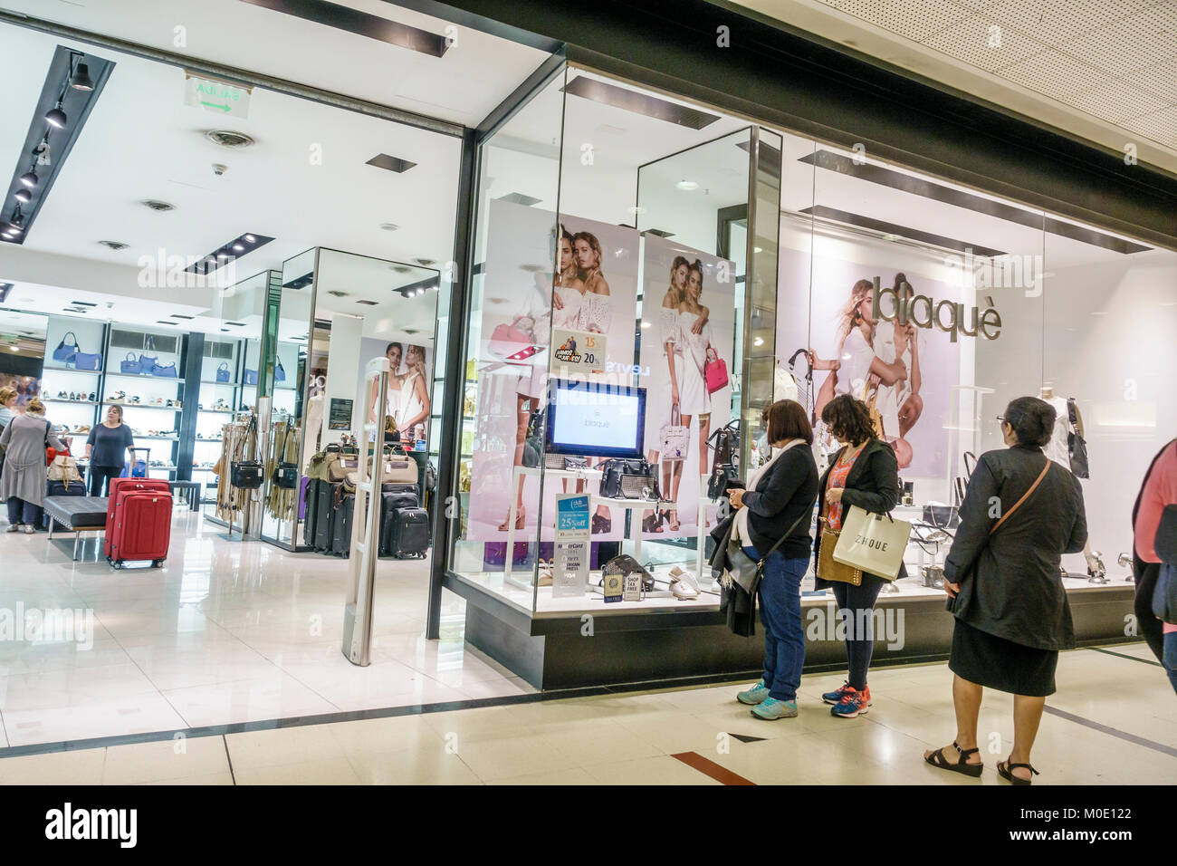 Buenos Aires Argentina,Abasto Shopping Mall,Blaque,store,shoes,accessories,store,window,adult adults woman women female lady,looking watching,entrance Stock Photo