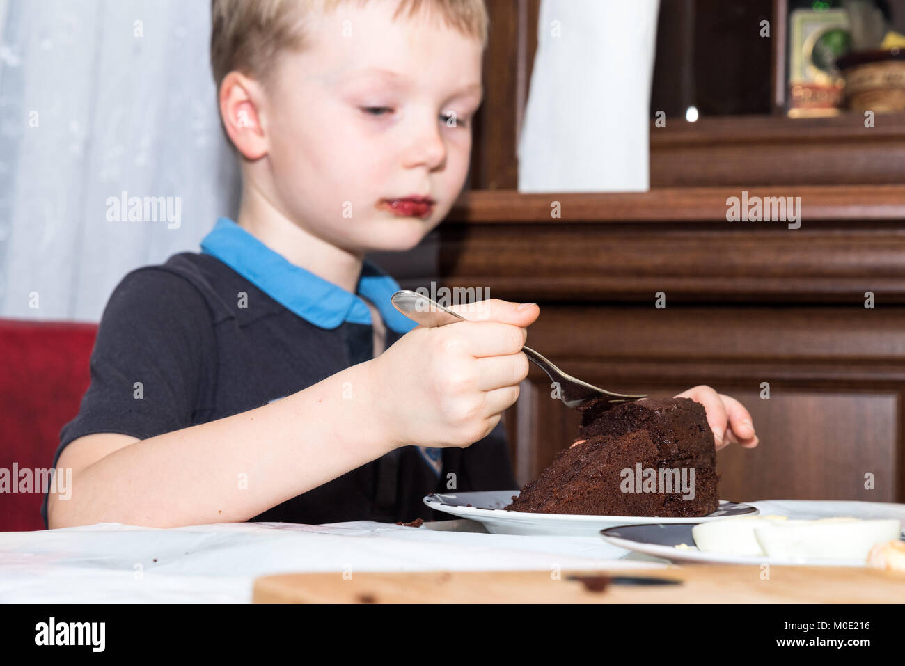 Boy eating beans hi-res stock photography and images - Alamy