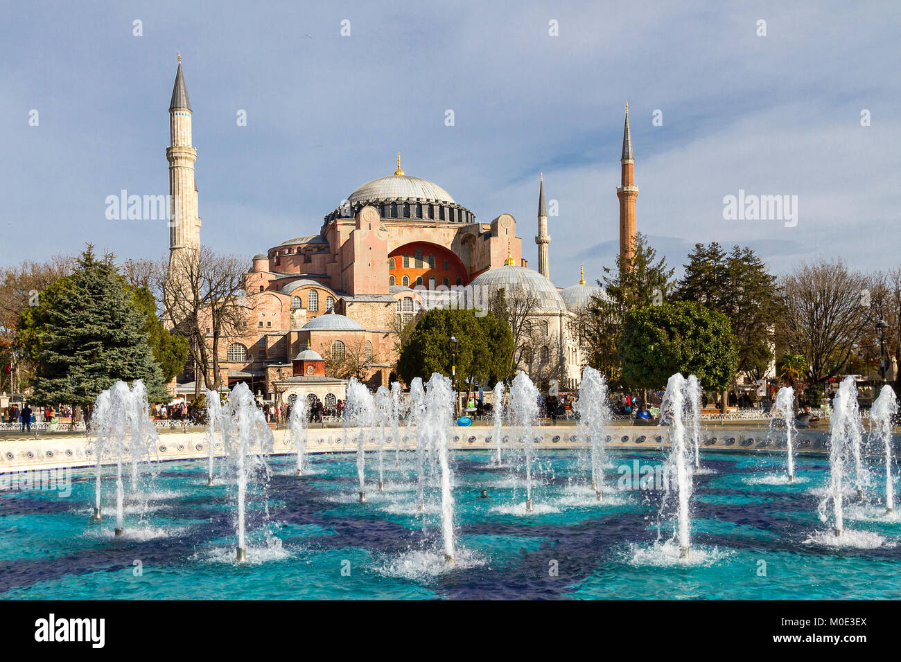 Park in Sultanahmet Square with the fountain and Hagia Sophia in the ...