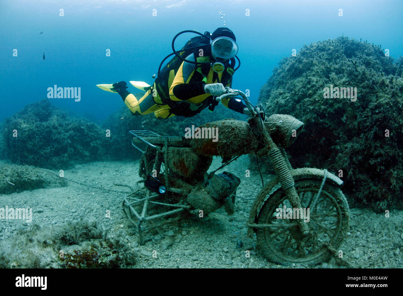 Scuba diver on a sunken motorbike, Zakynthos island,Ionian islands,  Greece, Europe Stock Photo