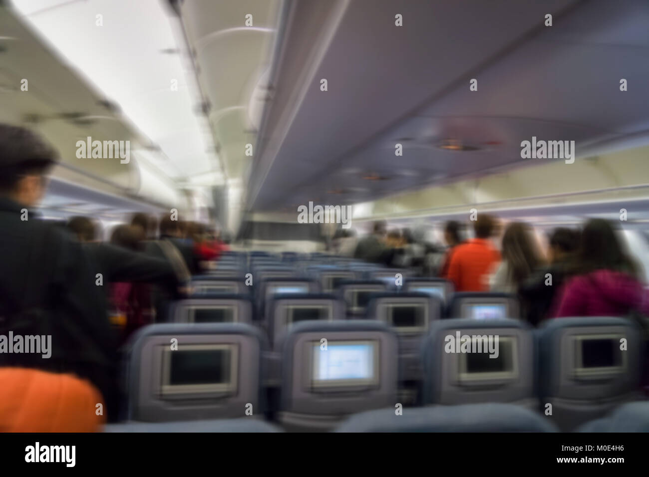 Passengers leaving airplane hi-res stock photography and images - Alamy