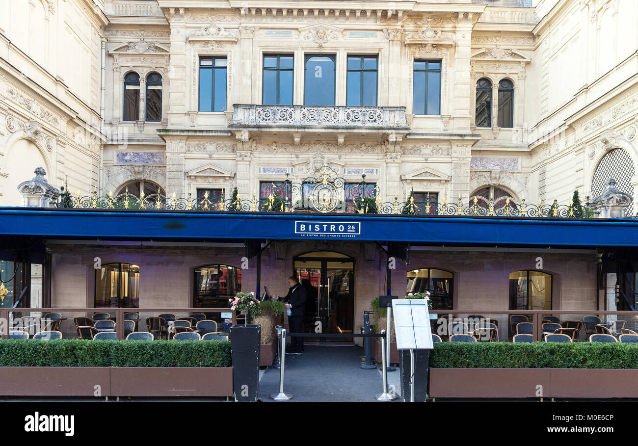The traditional French cafe bistro 25 on Champs Elysees avenue, Paris, France. Stock Photo