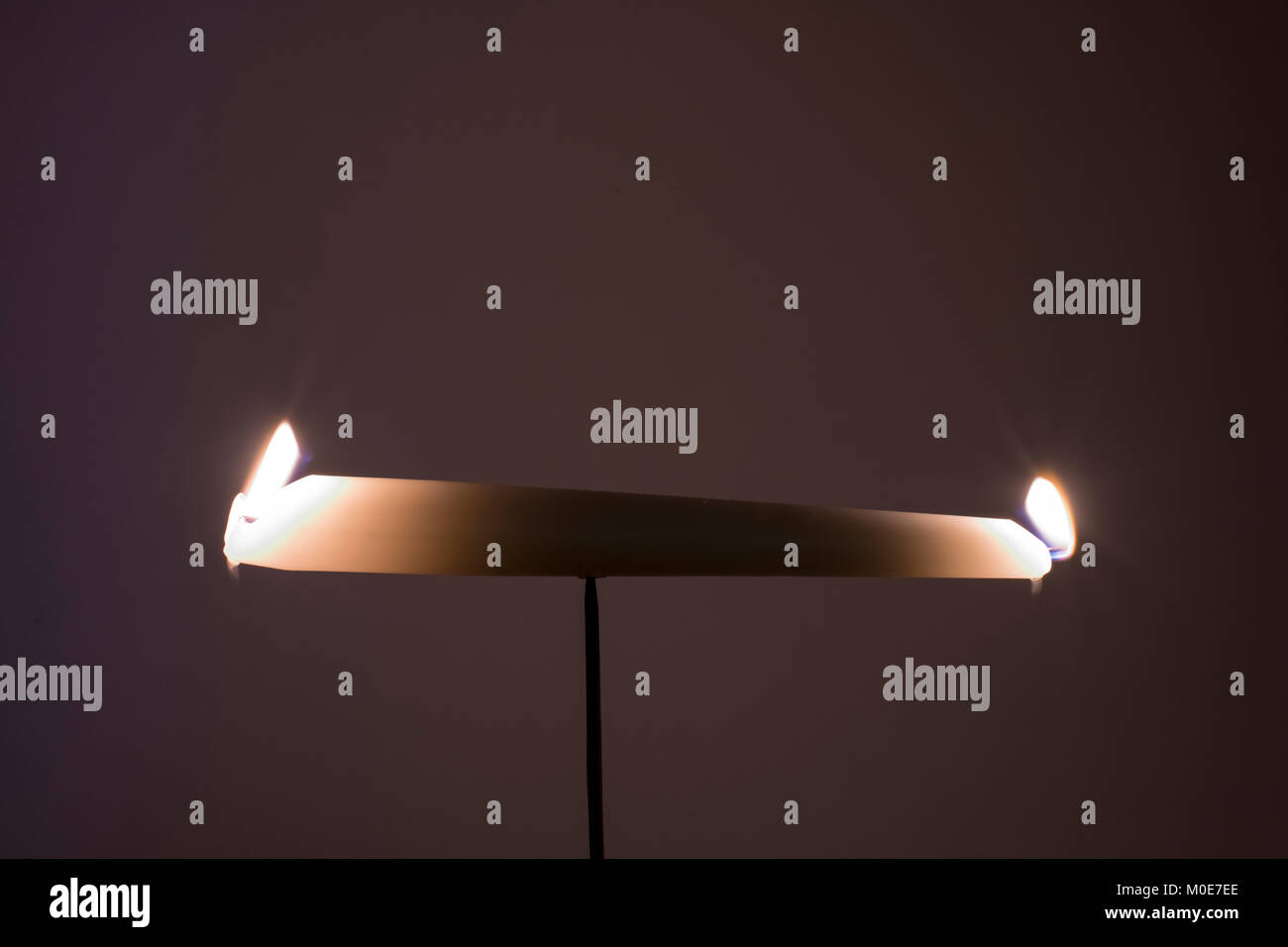 Burning candle both ends hires stock photography and images Alamy