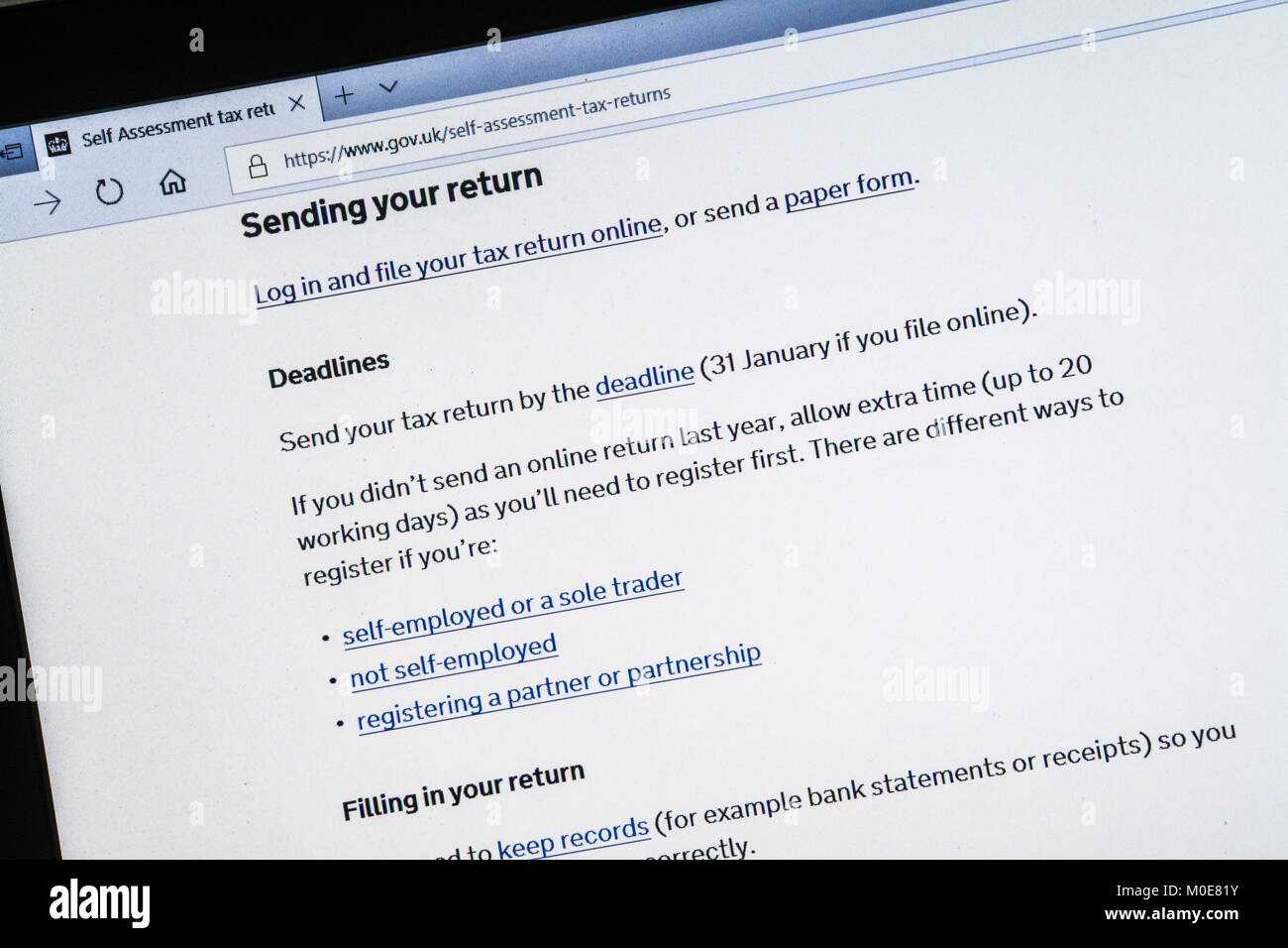 Computer screenshot with gov.uk website showing self-assessment tax return information 2018 Stock Photo