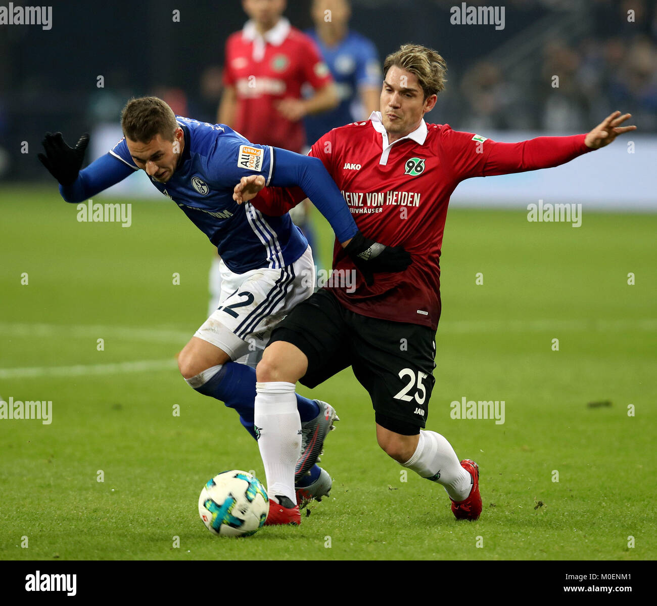Gelsenkirchen, Germany. 21st Jan, 2018. Oliver Sorg (R) of Hannover and Marko Pjaca of Schalke battle for the ball during the Bundesliga match between FC Schalke 04 and Hannover 96 at Veltins-Arena in Gelsenkirchen, Germany, January 21, 2018. Credit: Joachim Bywaletz/Xinhua/Alamy Live News Stock Photo