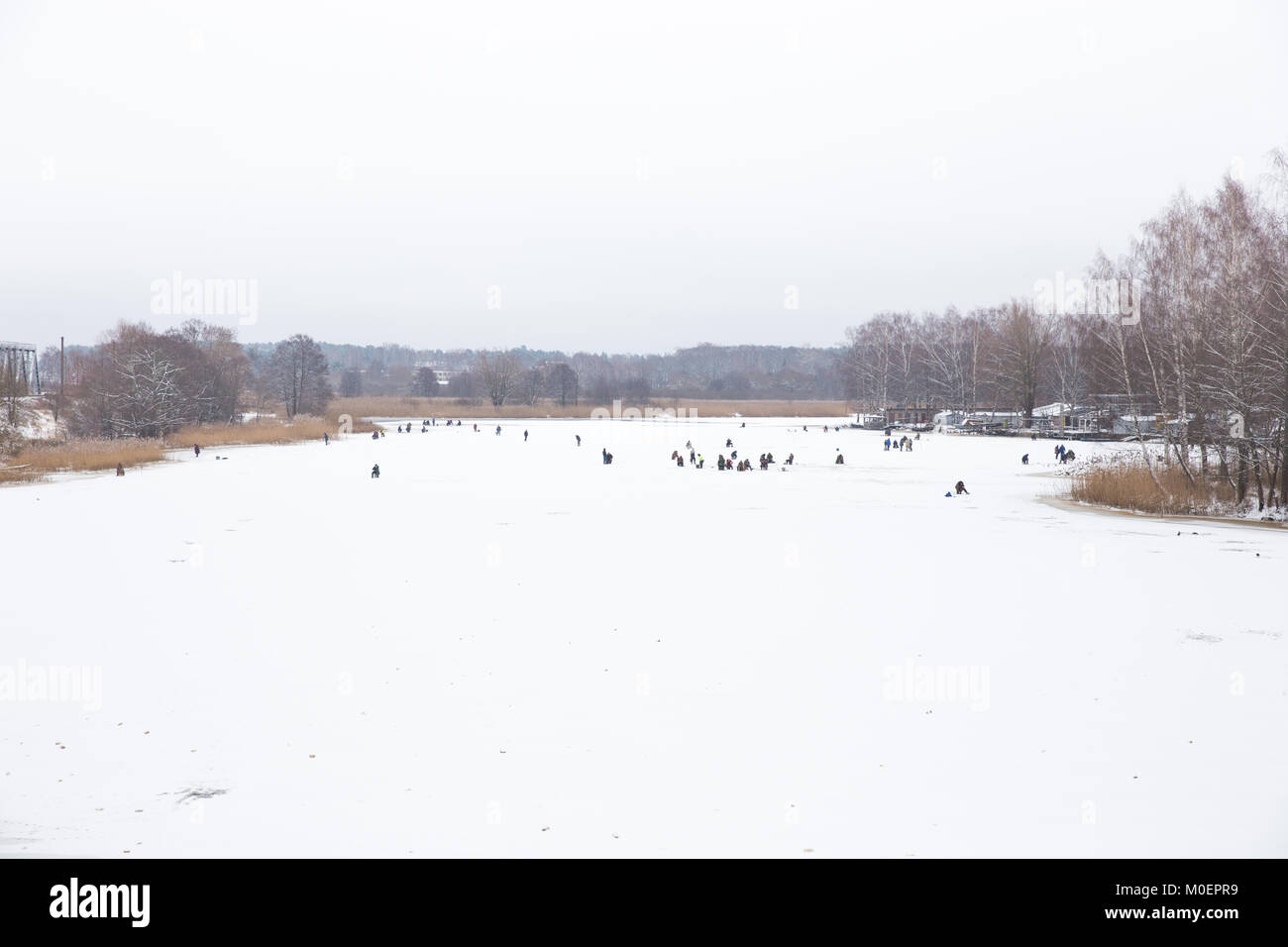 Jugla frozen lake, Riga, winter, ice and fishermans. 2018 Travel photo ...