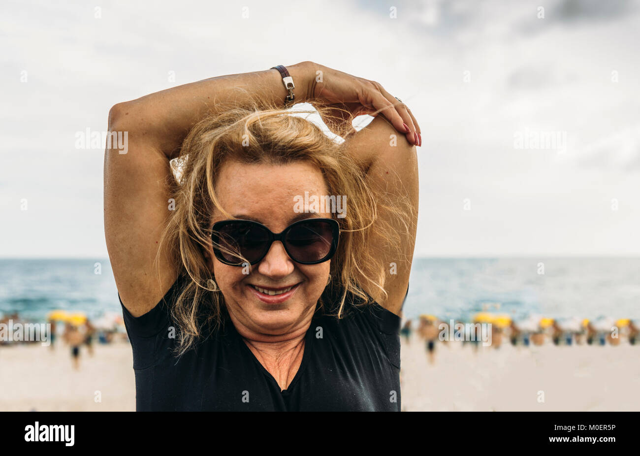 Elegant older woman smiling hi-res stock photography and images - Alamy
