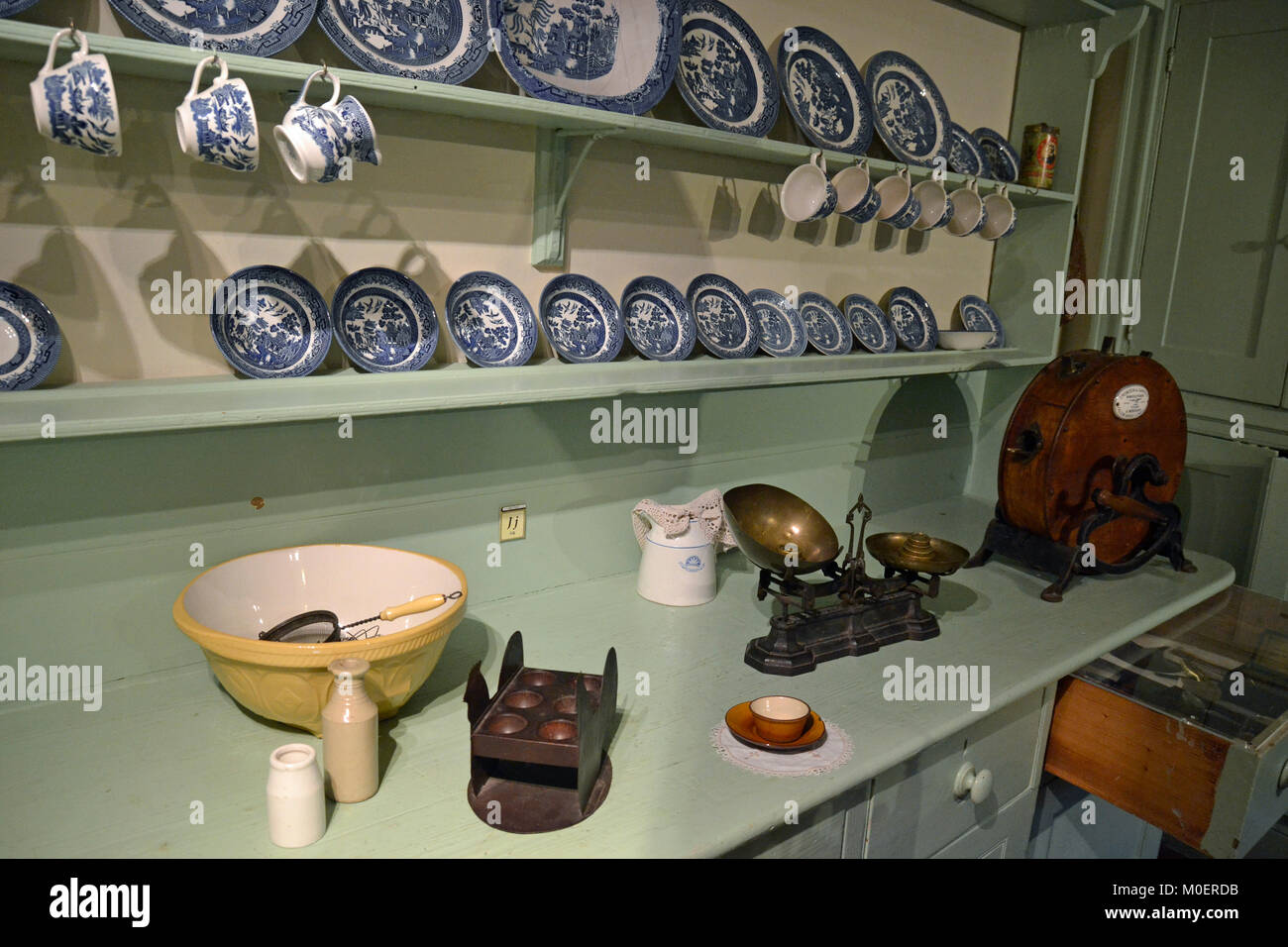 https://c8.alamy.com/comp/M0ERDB/display-of-crockery-on-shelves-in-the-kitchen-at-wycombe-museum-high-M0ERDB.jpg