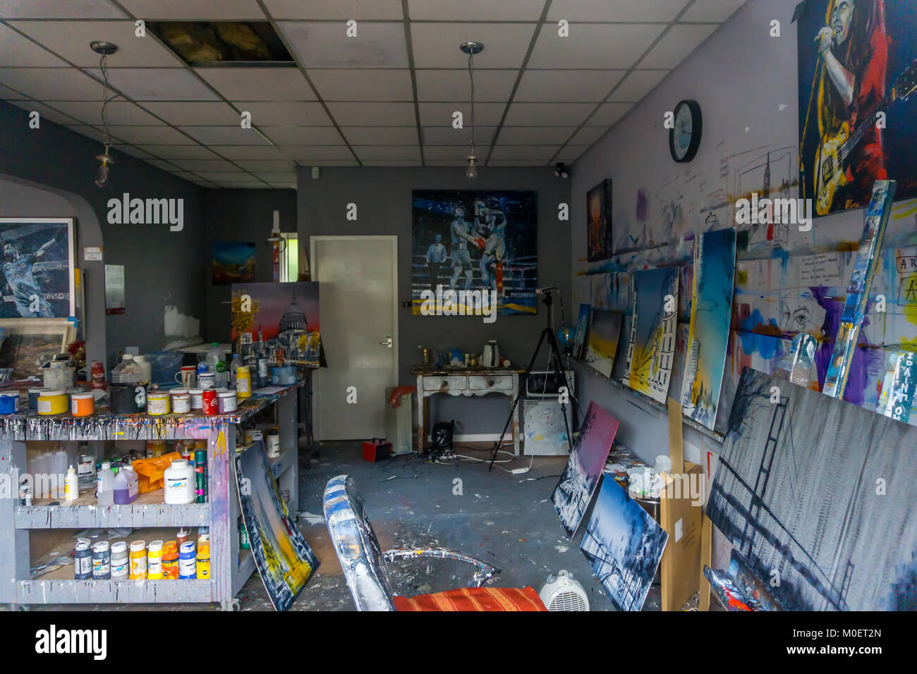 View through the window of 'Nigel Cooke Art Gallery & Studio',  Huddersfield Road, Holmfirth, West Yorkshire. A working art studio, shop and gallery. Stock Photo