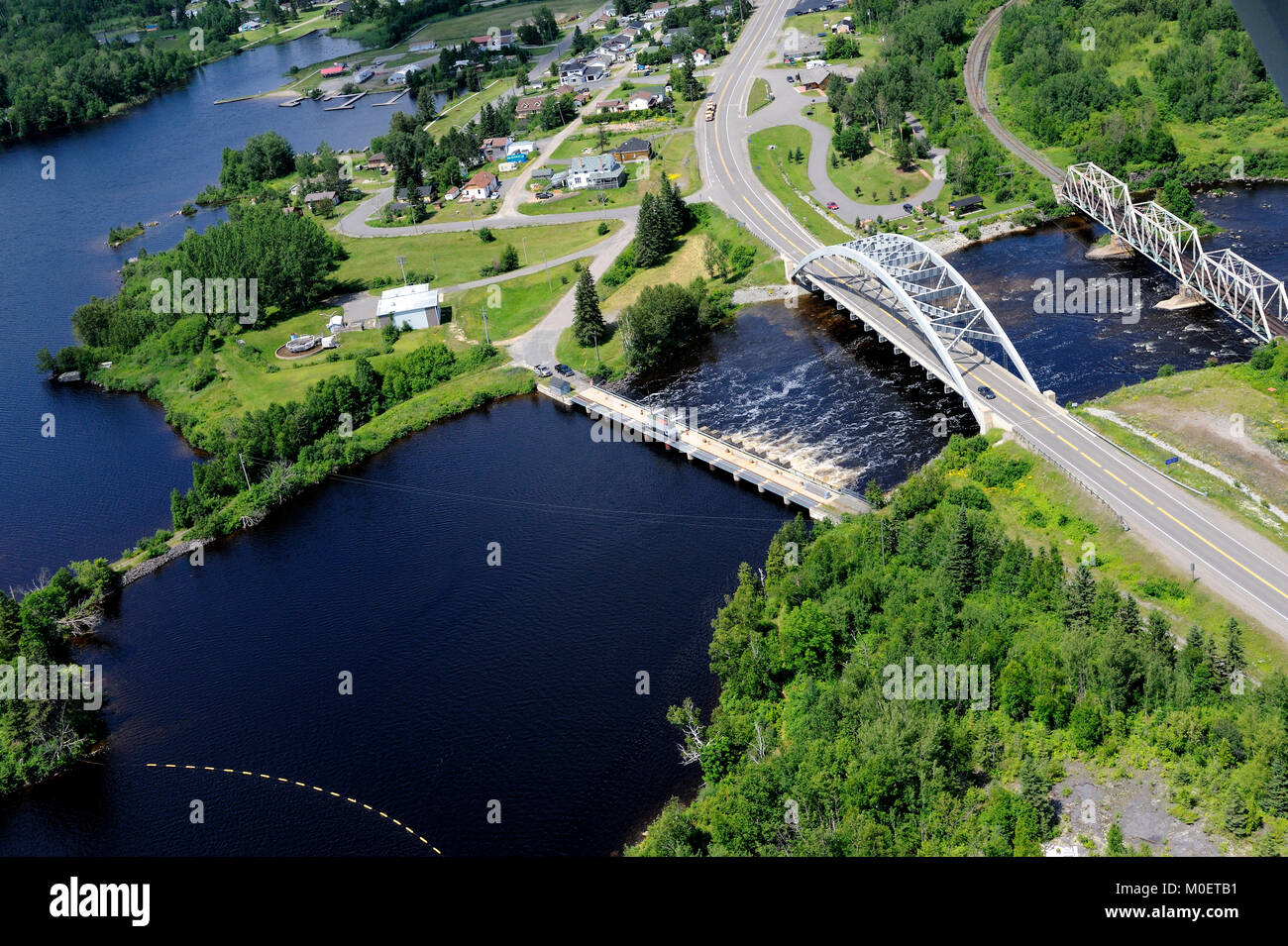 This is an aerial photograph of the Latchford Dam, between Bay Lake and