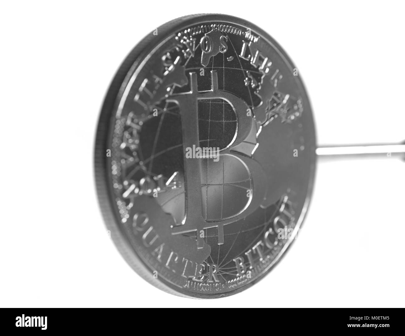 With a bitcoin coin Black and White Stock Photos & Images - Page 2 - Alamy