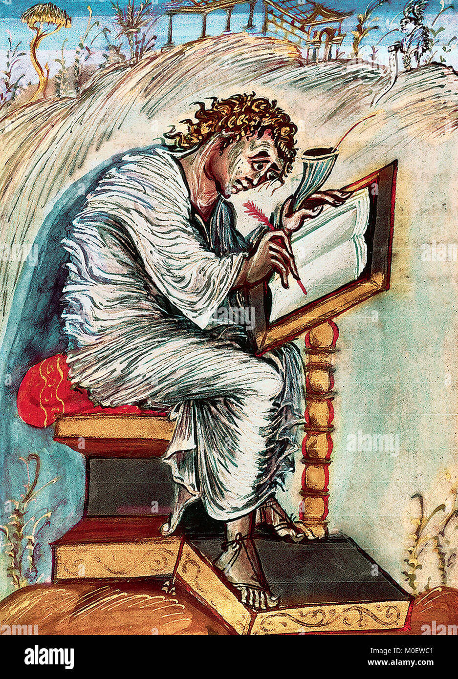 Saint Matthew writing a Gospel - Illustration of Saint Matthew, from the 9th century Ebbo Gospels Stock Photo