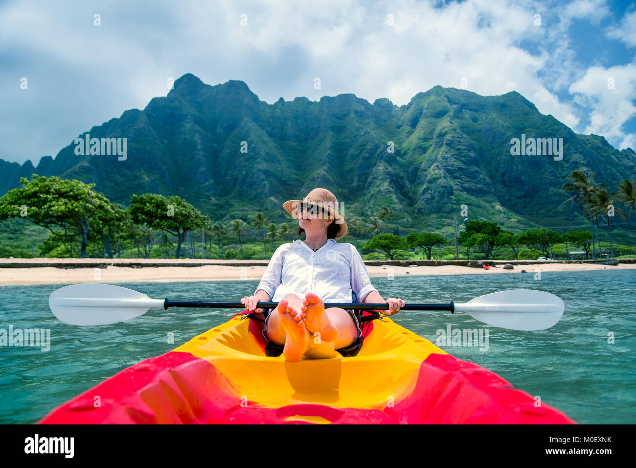 Woman Kayaking, Oahu, Hawaii, United States Stock Photo