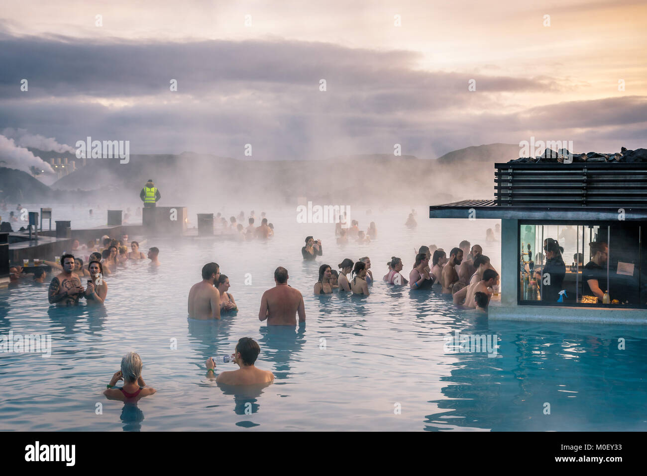BLUE LAGOON, Reykjanes Peninsula, Iceland. Crowds of tourists and people bathing and enjoying