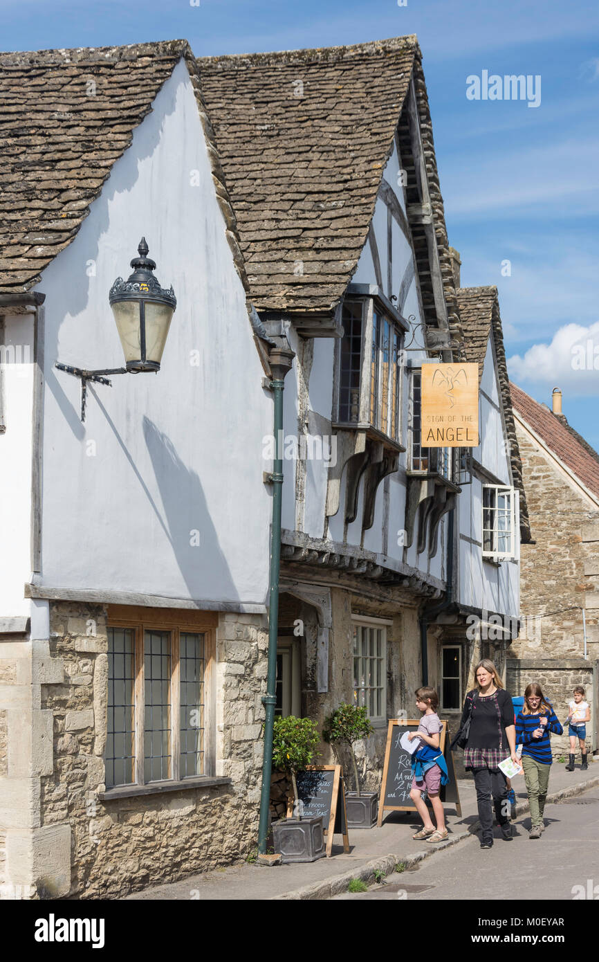 15th century Sign of the Angel Inn, Church Street, Lacock, Wiltshire, England, United Kingdom Stock Photo